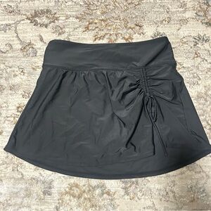 Black swim skirt with built in underwear and drawstring